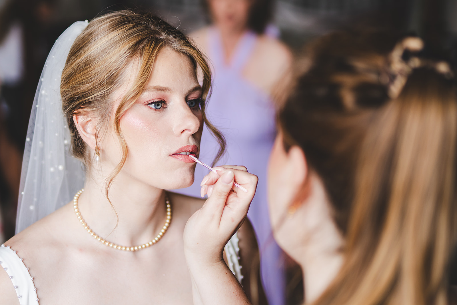 Josie having her bridal make up applied